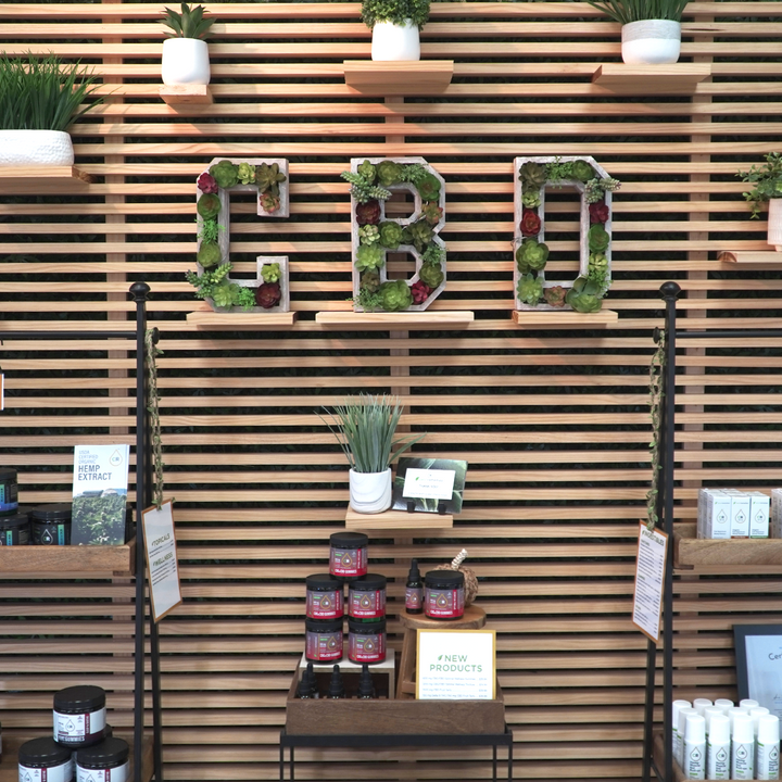 CBD  spelled with greenery on the wall